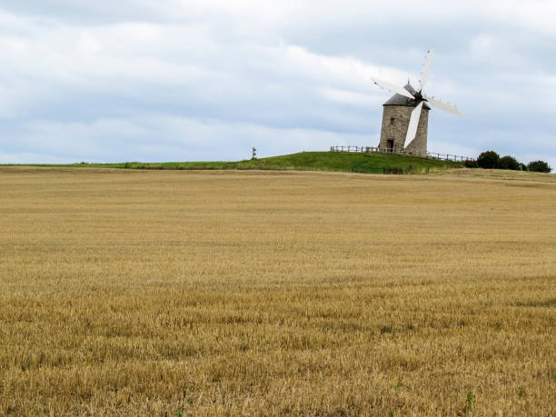istock Normandy, France. A typical Mill in the field. 898185702