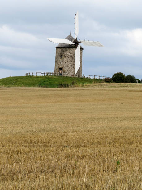 istock Normandy, France. A typical Mill in the field. 898185704