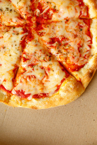 istock Delivery box with delicious pizza 898191780