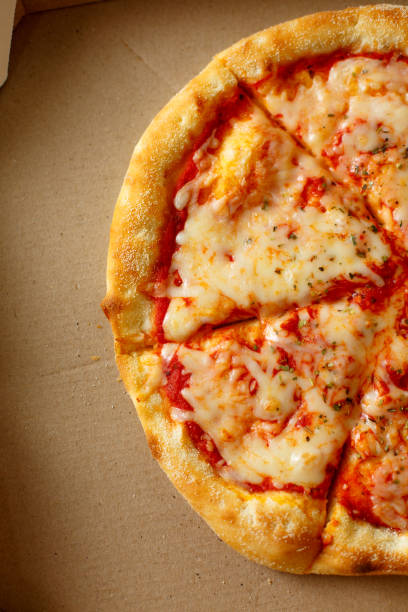 istock Delivery box with delicious pizza 898191806