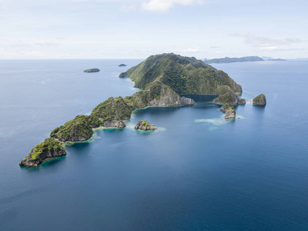 istock Calm Seas and Limestone Islands in Raja Ampat 898203162