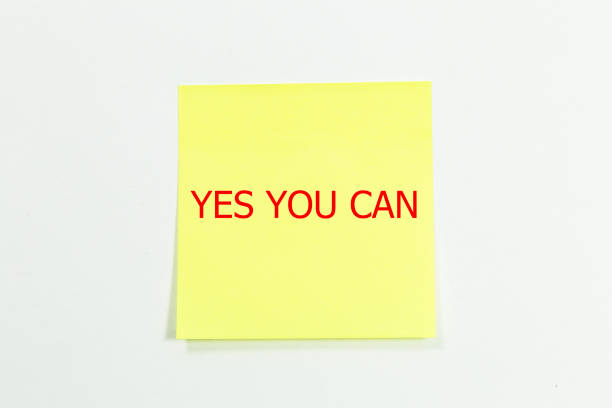 istock yes you can word written on yellow sticky notes. isolated on white 898206120