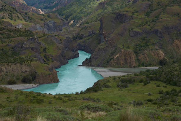 Confluence of the Rio Chacabuco with the glacial blue waters of the Rio Baker along the Carretera Austral in Patagonia, Chile.