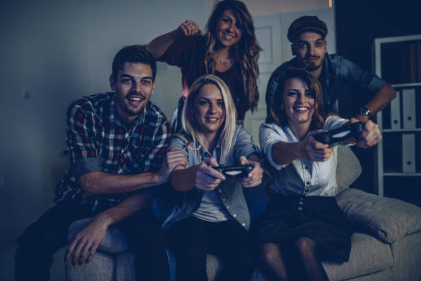 istock Friends playing video games 898209320