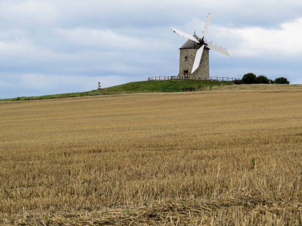 istock Normandy, France. A typical Mill in the field. 898212404