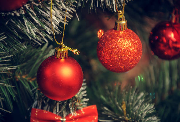 istock Christmas decorations on an artificial Christmas tree, a photograph in a vintage style 898212874