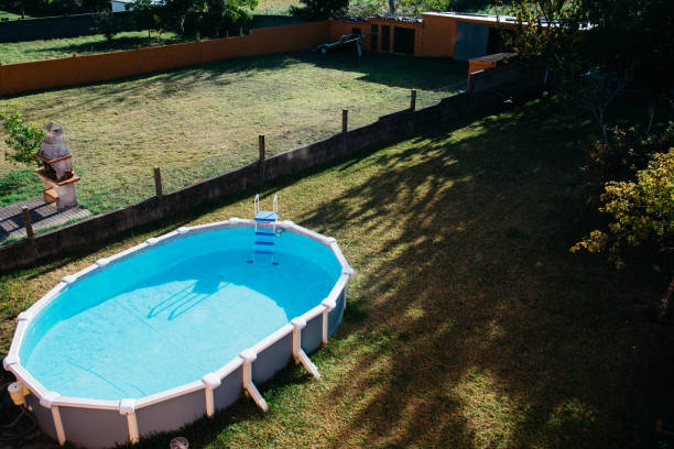 swimming pool in the backyard - above ground pool imagens e fotografias de stock