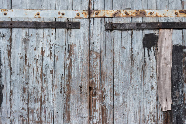 istock Doors of an old wooden barn 898230808