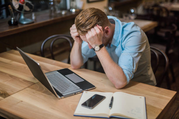 istock Young entrepreneur working late at night 898231702
