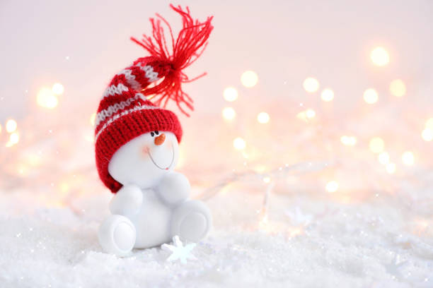 istock Festive Christmas background with snowman on the snow 898233832