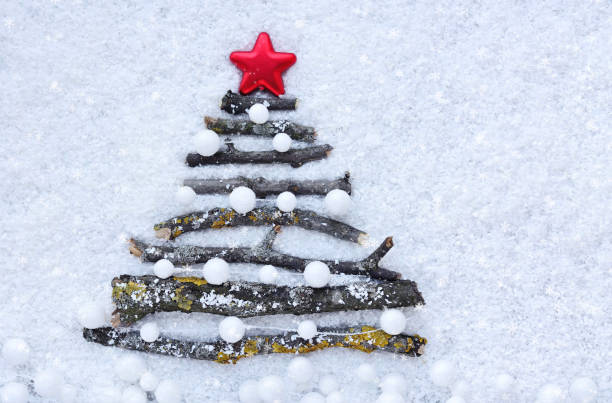 istock Greeting card. Decorative Christmas tree on the snow. Christmas background with space for your text. 898233984
