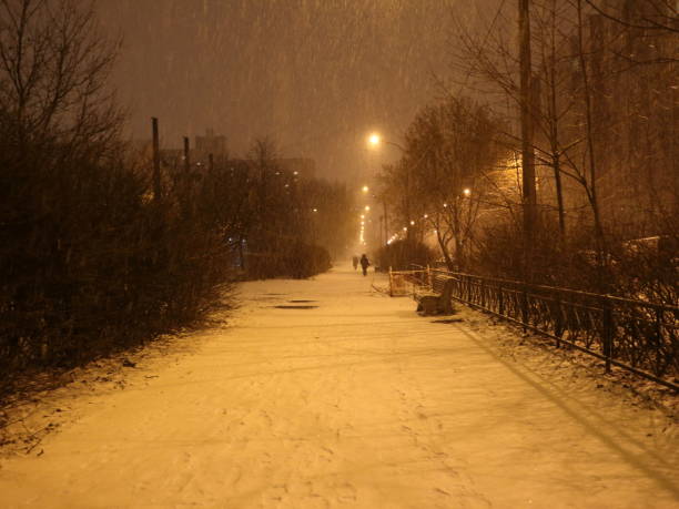 istock snow-covered trail in a snowfall in the early morning 898235162