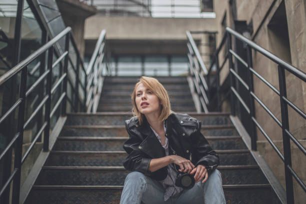 istock Young woman photographer 898238410
