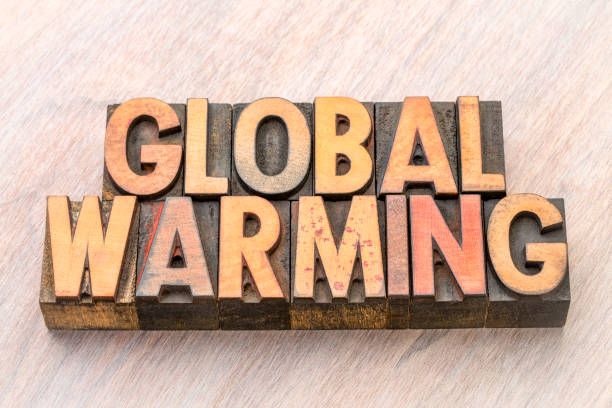 istock global warming word abstract in wood type 898246148