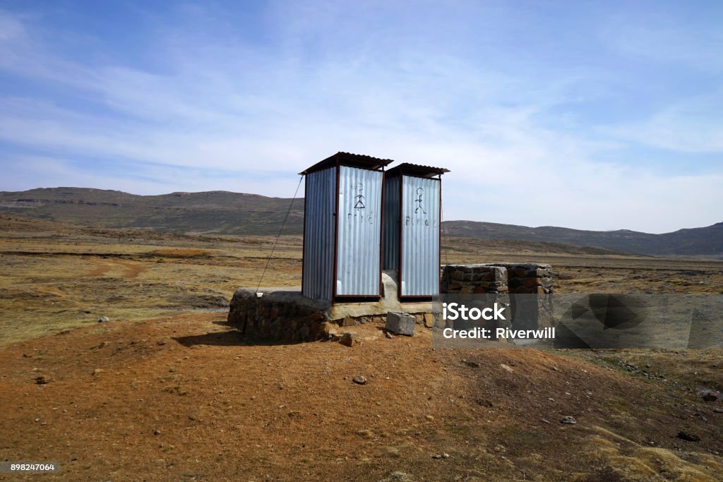 An isolated toilet in Sani Pass border in Lesotho, Africa. It's an isolated toilet in Sani Pass border in the southeastern Lesotho, Africa. So strange but beautiful view. Africa Stock Photo