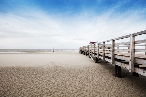 Beach of St. Peter-Ording in Germany with pile dwelling