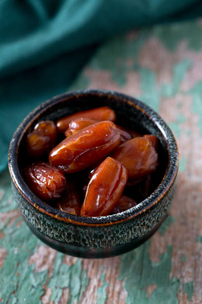 istock dried dates in a bowl 898248386