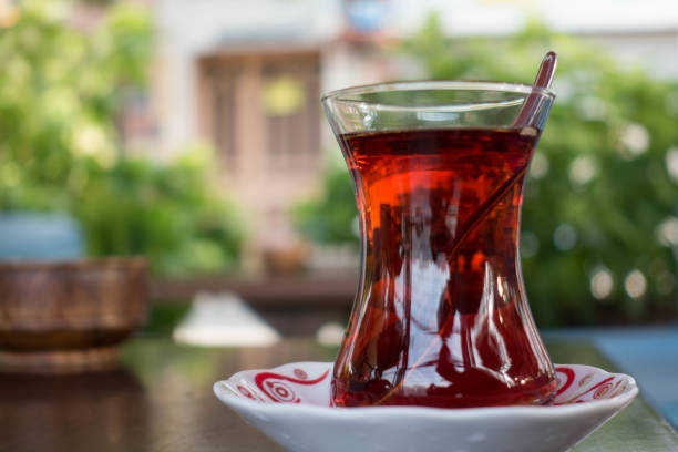 istock Turkish Black Tea With Traditional Glass on Table 898249920