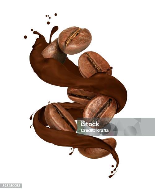 Coffee Beans Moves In Chocolate Splashes On White Background Stock Photo - Download Image Now