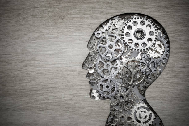 istock Brain model concept made from gears and cogwheels on wooden background 898250724