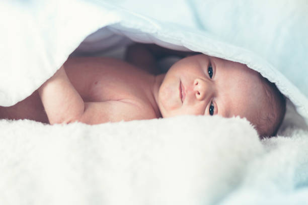 istock Newborn little boy. Shallow depth of field. 898252540