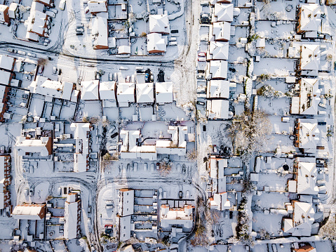 Snow, ice and adverse weather conditions bring things to a stand still in the housing estates of a British suburb