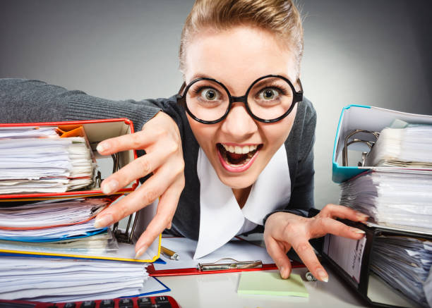 istock Insane office woman at work. 898253480