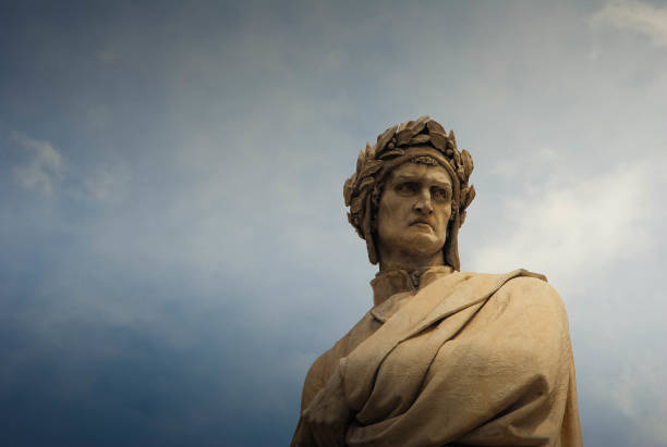 Statue of Dante Alighieri in Piazza Santa Croce, Florence, Italy. Statue of Dante Alighieri in Piazza Santa Croce, Florence, Italy. Bust shot, copy space, blue sky background. piazza di santa croce stock pictures, royalty-free photos & images