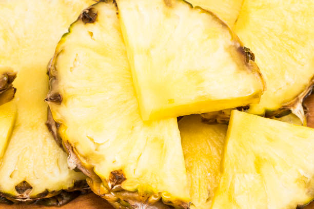 istock Beautiful texture slices of pineapple fruit close-up 898254834
