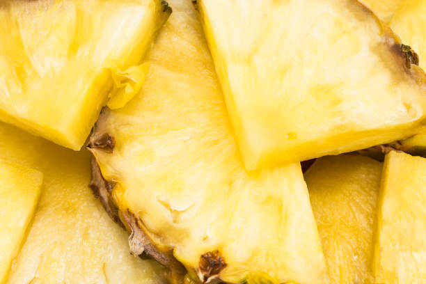 istock Beautiful texture slices of pineapple fruit close-up 898254854
