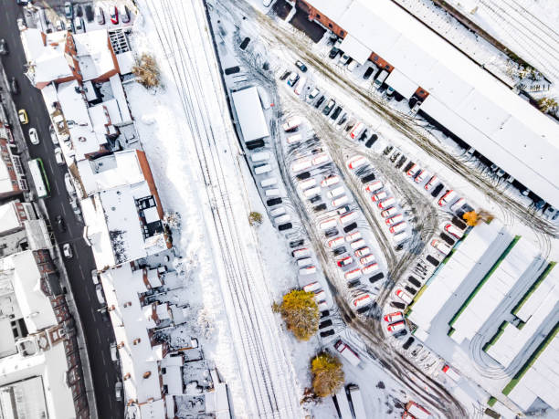 istock Aerial view of snow compromised rail and road networks. 898255470