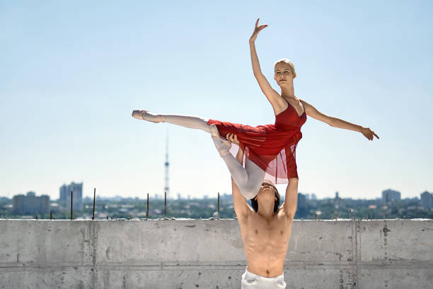 istock Ballet dancers posing outdoors 898255658