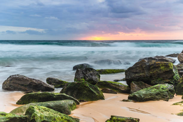 istock Rocky and Moody Dawn Seascape 898257762