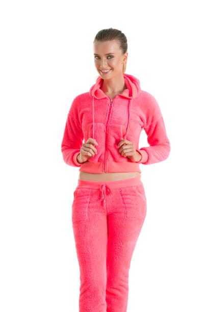 istock Beautiful young smiling woman in tracksuit. 898258580