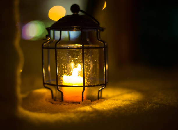 istock Art Christmas lantern with snowfall 898261550