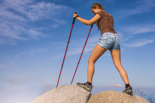 istock Woman hiker at mountain peak 898261644