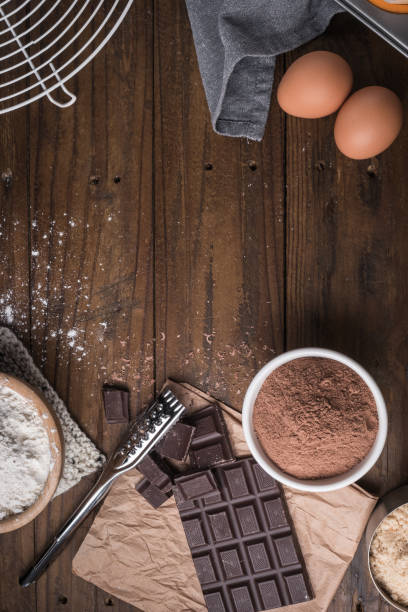 istock Ingredients to cooking muffins in a rustic setting on wooden table with copyspace. 898261772