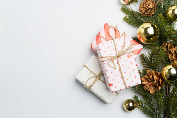istock christmas gift presents in decorative boxes white background 898262454