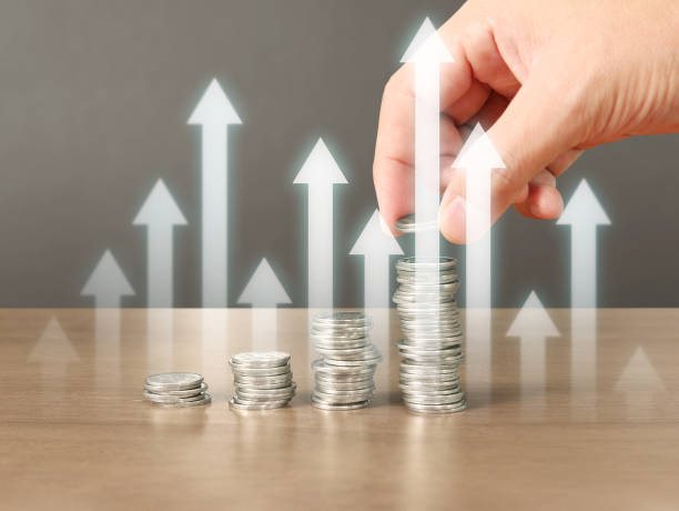 istock human hand putting coin to money 898267974