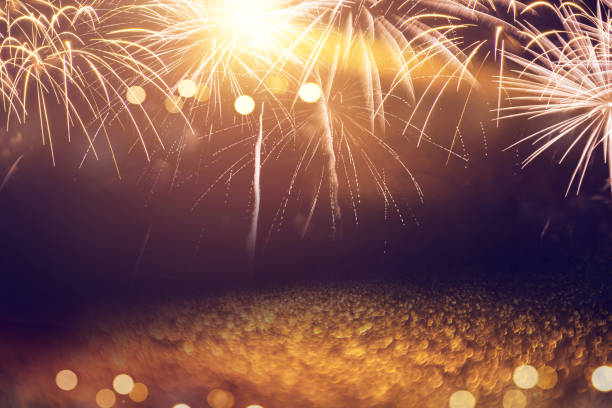 istock Fireworks and bokeh in New Year eve and space for text. Abstract background holiday. 898274328