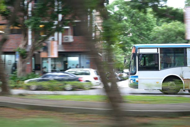 istock Blur motion of bus driving on road during rush hour 898277578