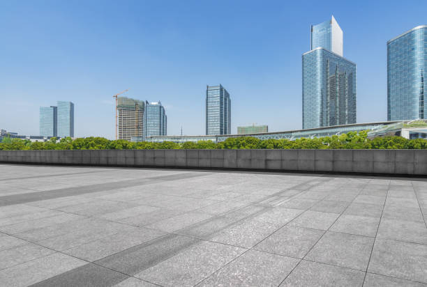 istock Empty pavement front of modern office buildings 898282220