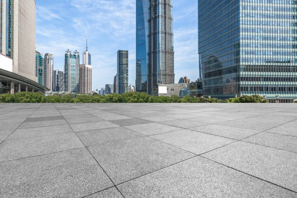 istock Empty square with modern city skyline in background 898284180