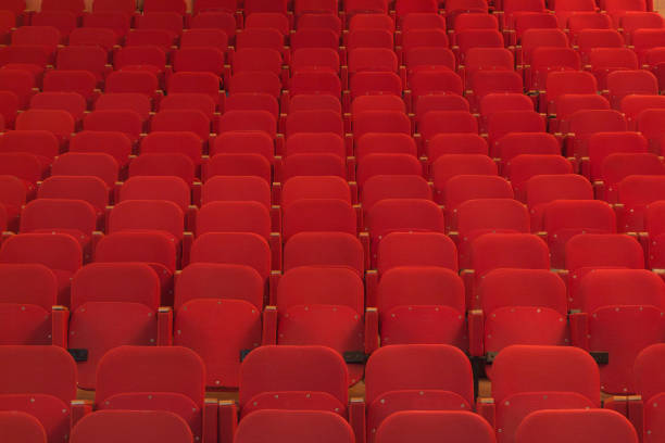 istock View of an empty theatre with old red seats 898286500