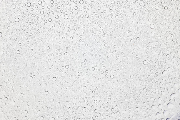 istock Water drops on glass, Rain droplets on glass background. 898286550