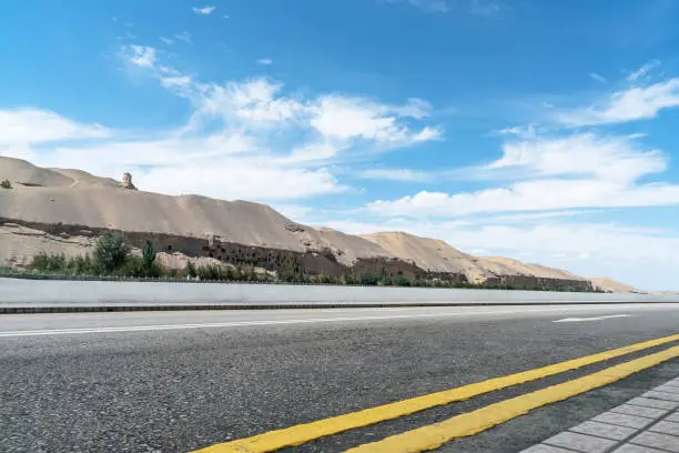 desert highway of dunhuang city,gansu province,china.