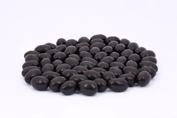 istock Dragee - pistachio in chocolate glaze 898289756