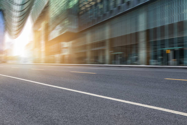 istock City empty road with modern buildings background 898289864