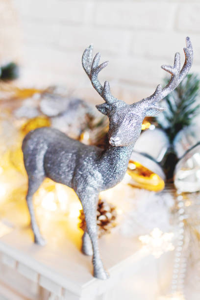 istock Christmas and New Year decorations with silver deer. Holiday winter background. 898293330
