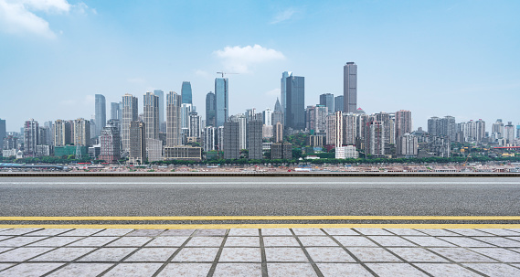 empty road and modern office block buildings against sky,Chongqing city,China,Aisa.